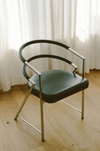 Modernist Chrome and Black Upholstered Armchairs